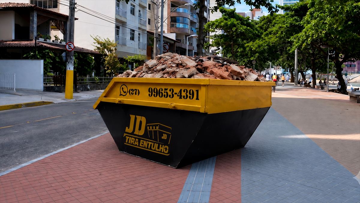Caçamba da JD Tira Entulho Guarapari cheia de entulho na calçada